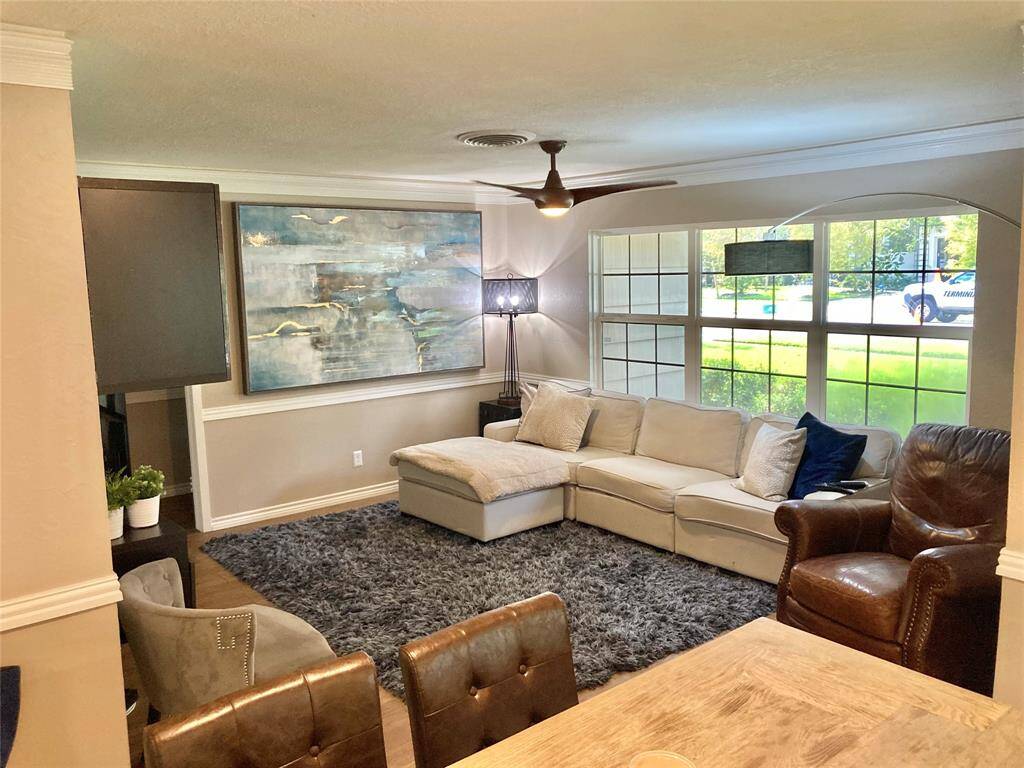 Beautiful living room with large picture windows.