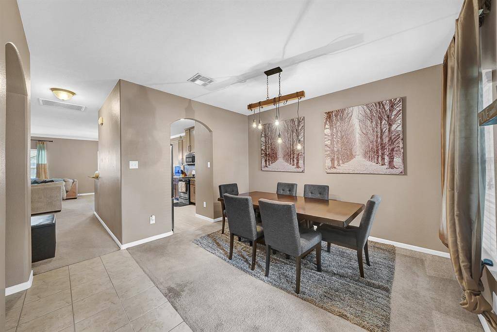 A view of your formal dinning with upgraded fixture