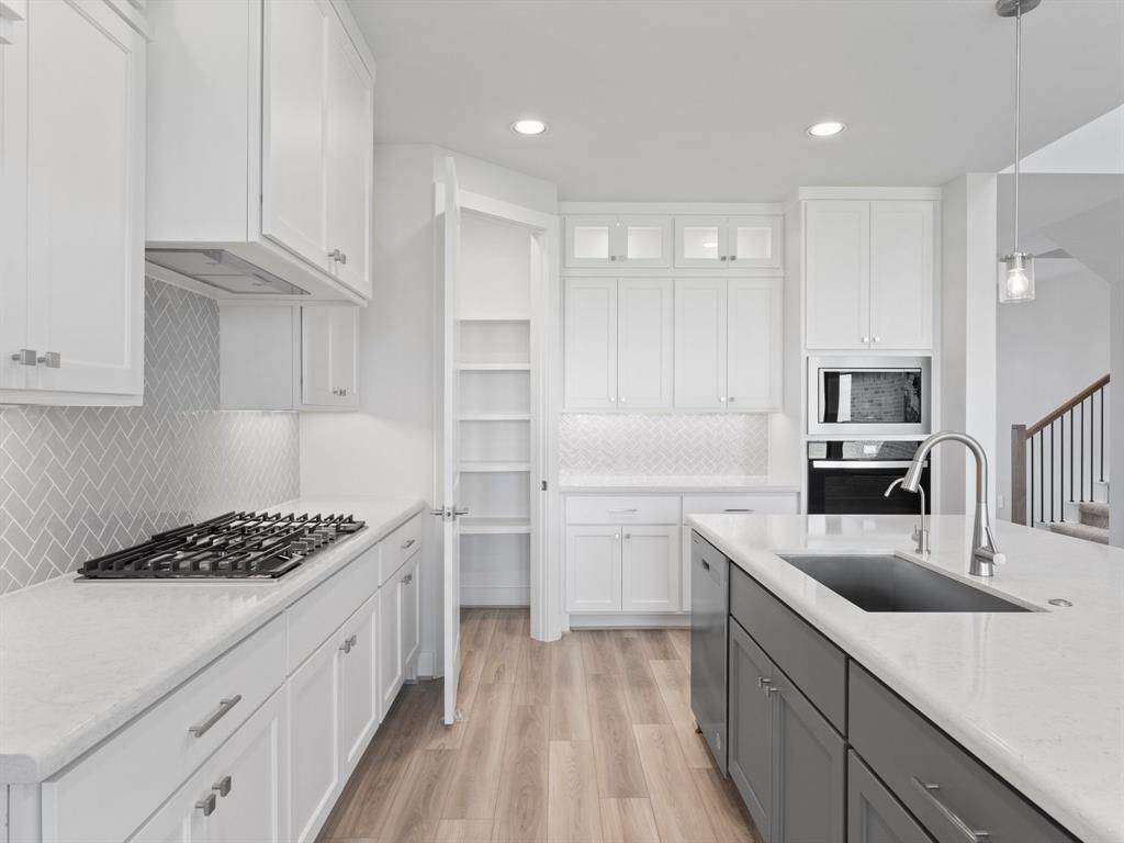 Cabinets to the Ceiling with Hardware and Walk-in Pantry