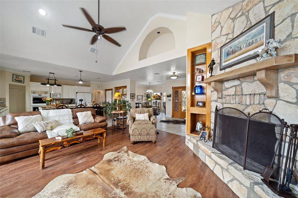 This amazing wood burning fireplace brings so much character to this space!