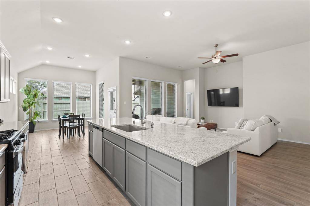 Great view from the kitchen to the breakfast area to the living room!