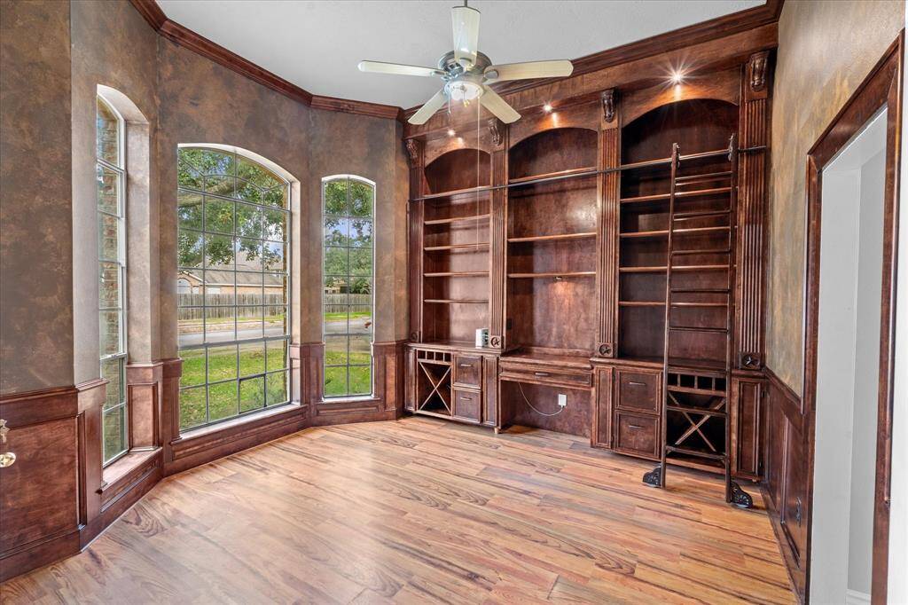Office with built in library.
