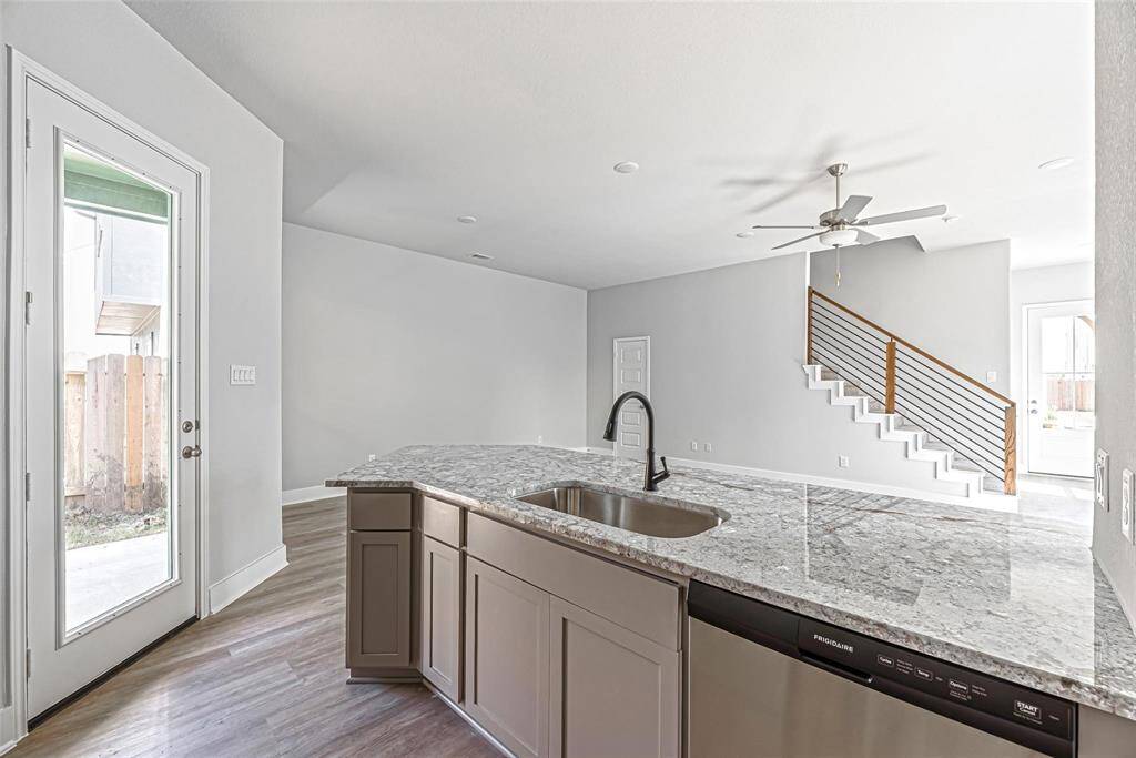 The heart of the home - the kitchen - doesn't fall short! Just look at these stunning granite counters, lovely cabinets, and stainless appliances! HELLO dream kitchen!