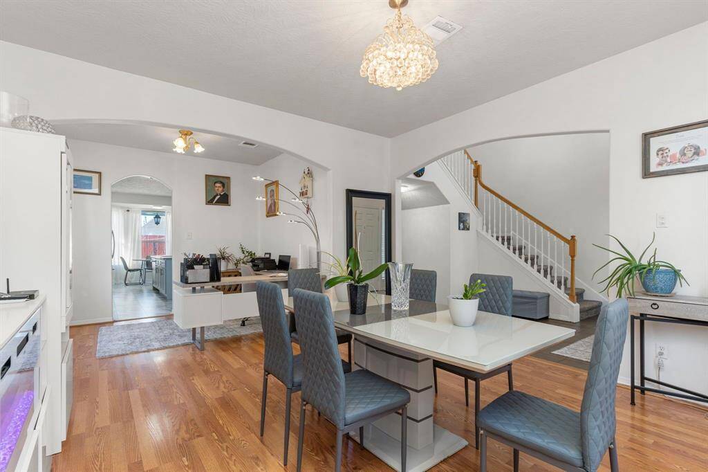 The elegant formal spaces seamlessly flow into one another, creating a graceful and open atmosphere!