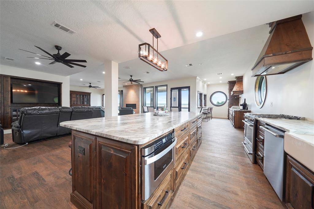 Oversized island with drawer microwave.