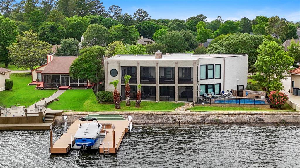 Enjoy time on the lake, ready for all your lake toys. This home has an expansive amount of water frontage.