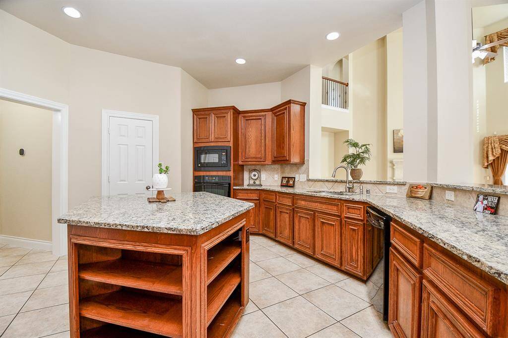 Kitchen island with plenty of shelves!