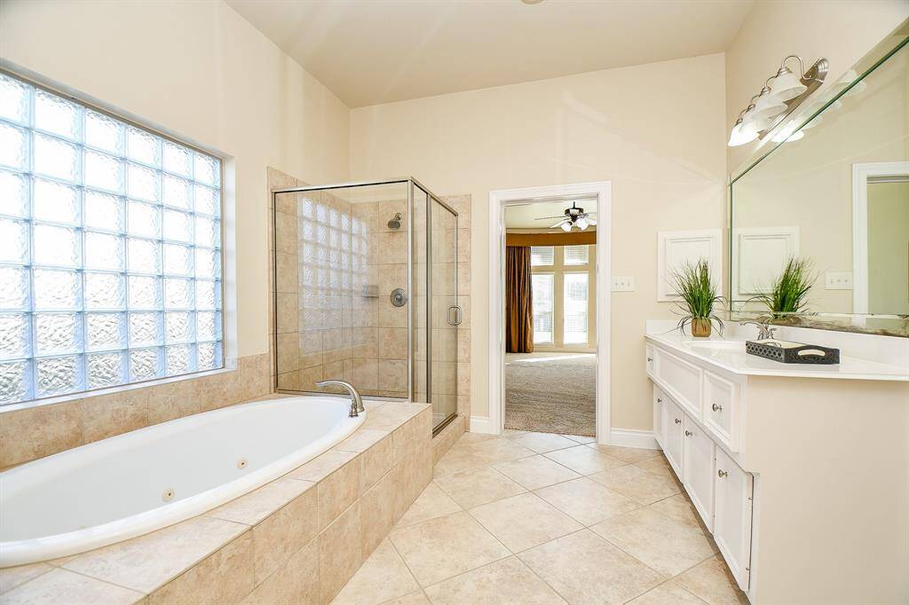Spacious primary bath with a hot tub!
