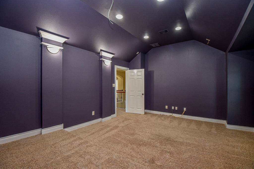 Enjoy watching a movie under the dimmable light fixtures!