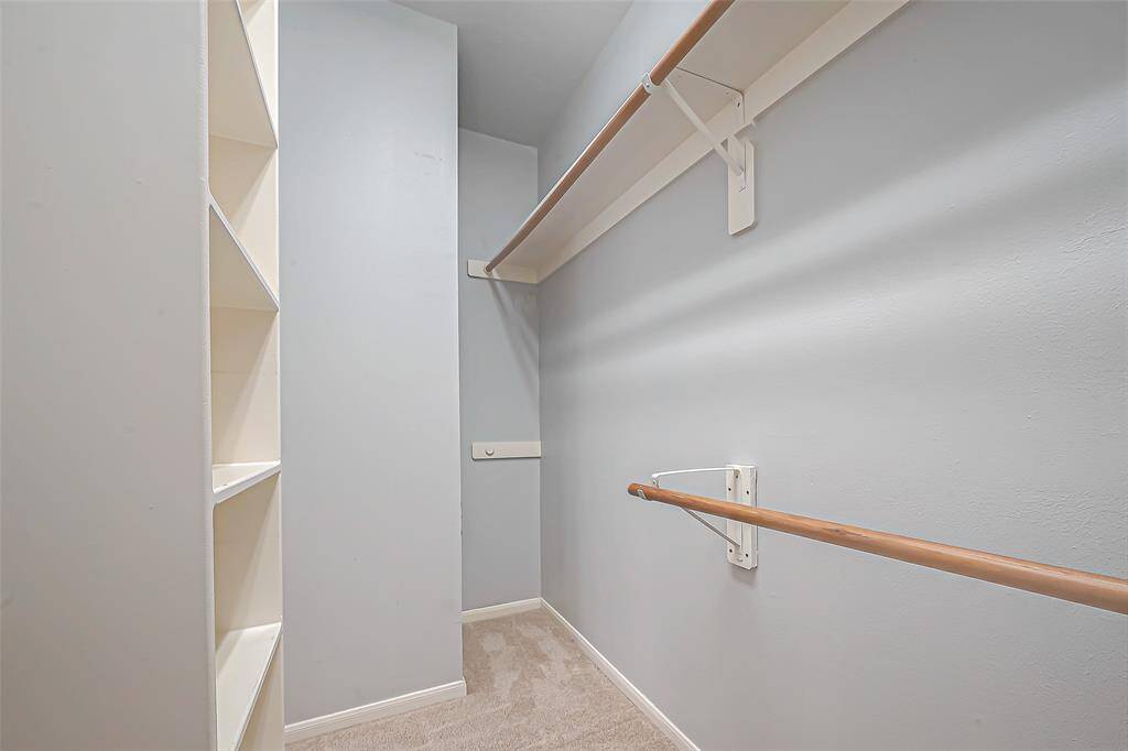 Primary Closet- TONS of storage.
