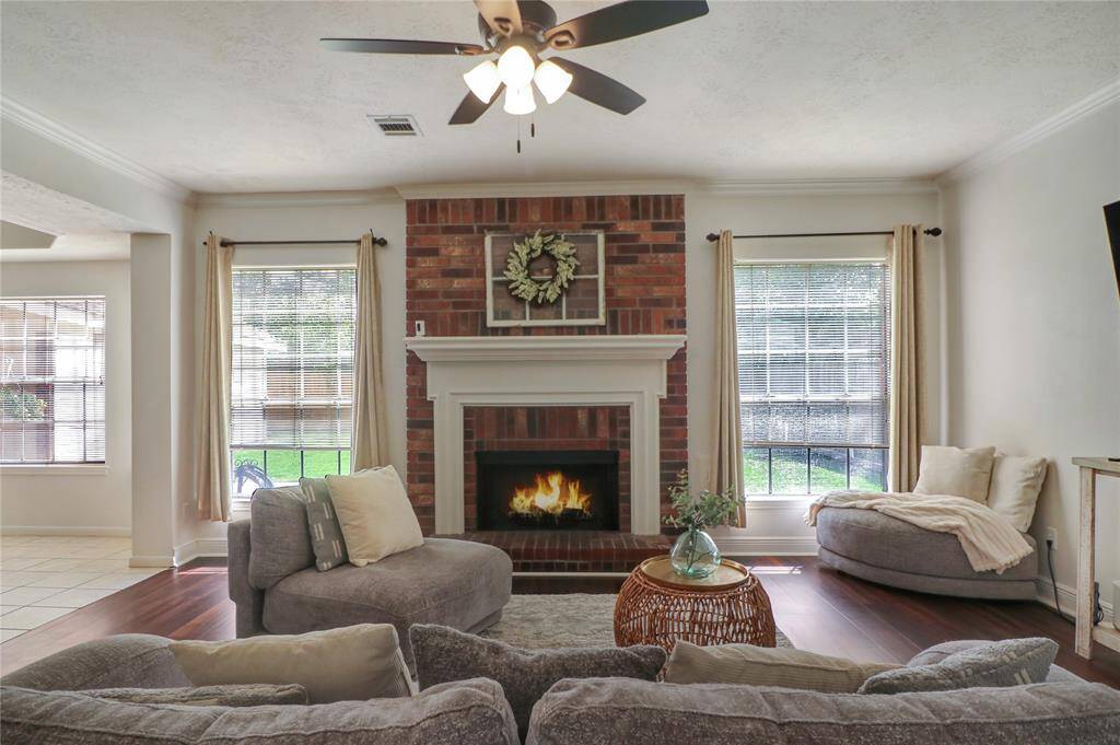 Spacious Family room. With views of the back yard and easy access to the breakfast and kitchen area.