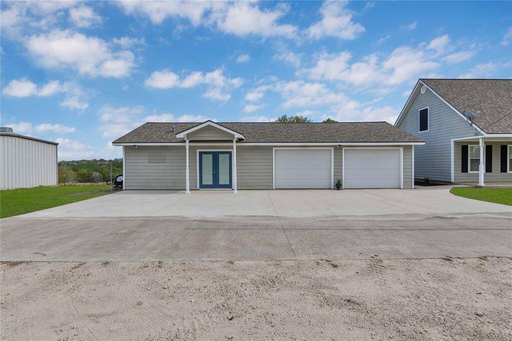 Large 2 car garage and entrance into guest suite
