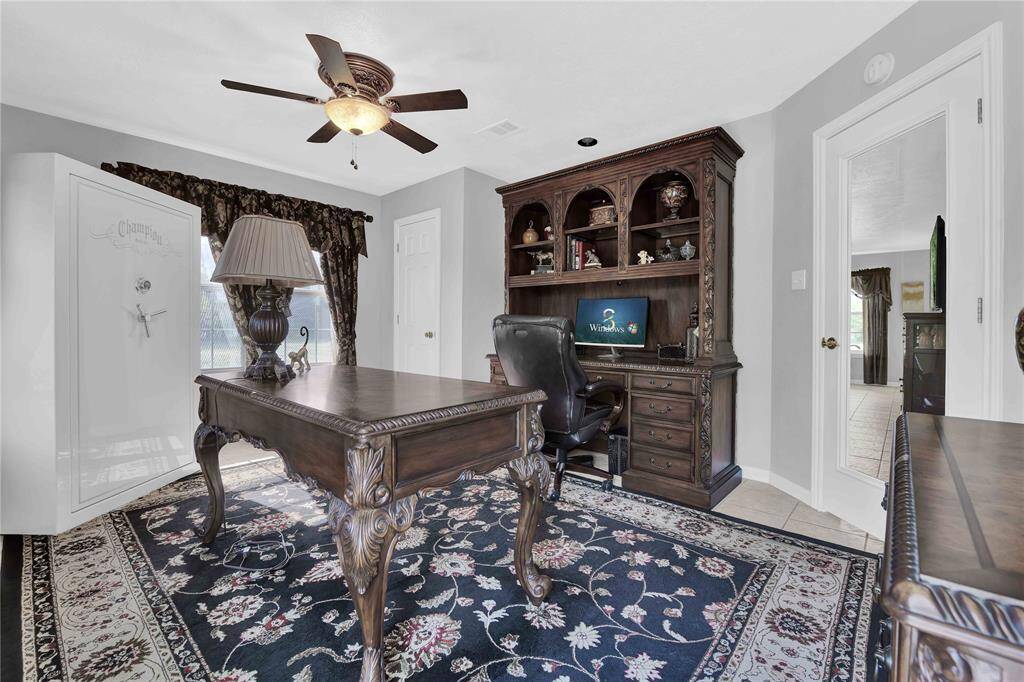 Additional bedroom downstairs, currently used as an office