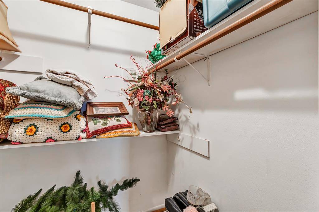 Lots of storage in Primary closet...