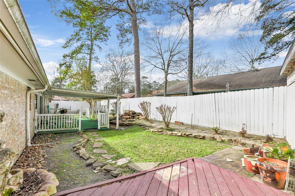 Extended patio leads to a storage shed...
