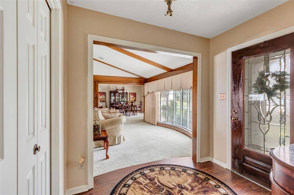 Entry opens to formal living area...