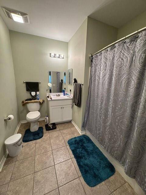 Primary Bath with Shower/Tub combo.