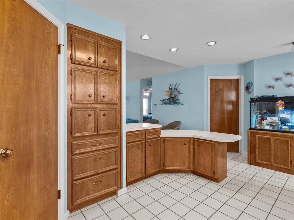 Pantry and cabinetry has plenty of space for food and appliances.
