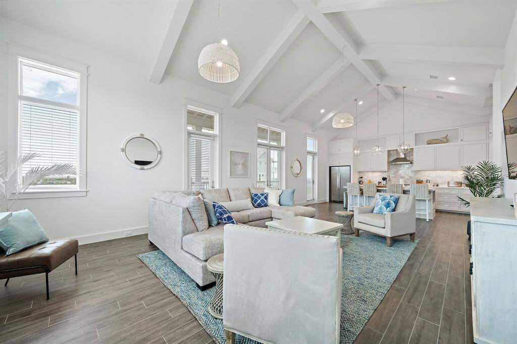 Open living/dining/kitchen space is perfect for gathering with friends and family