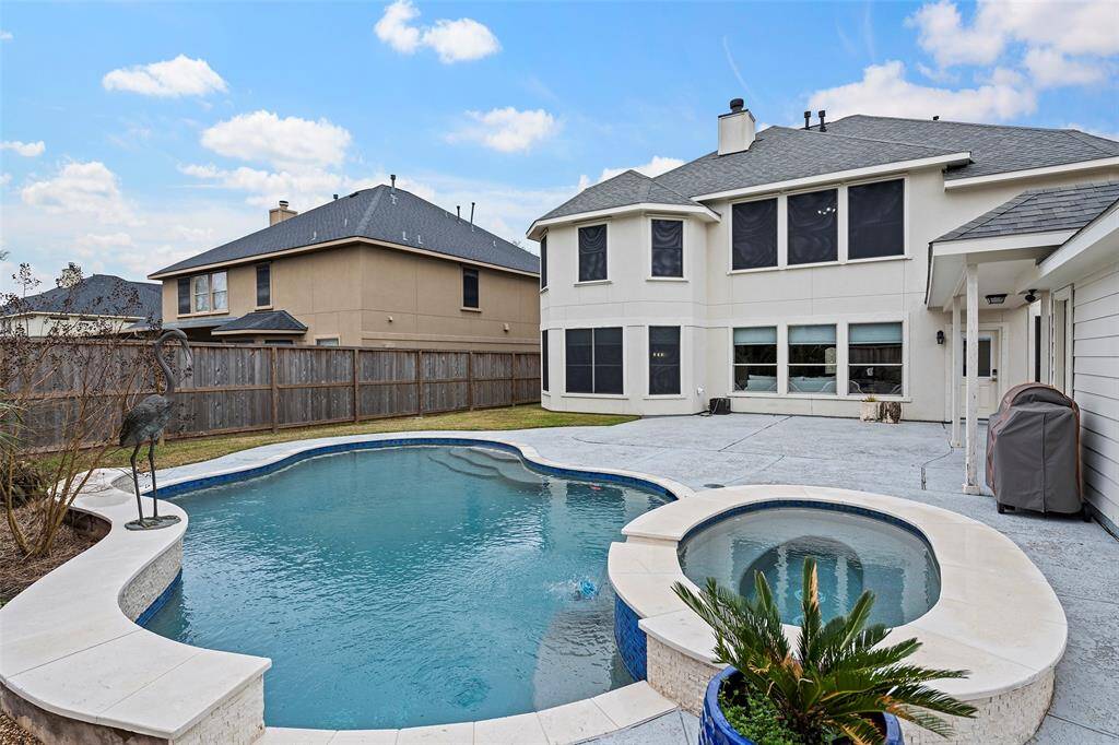 Serene private pool with hot tub