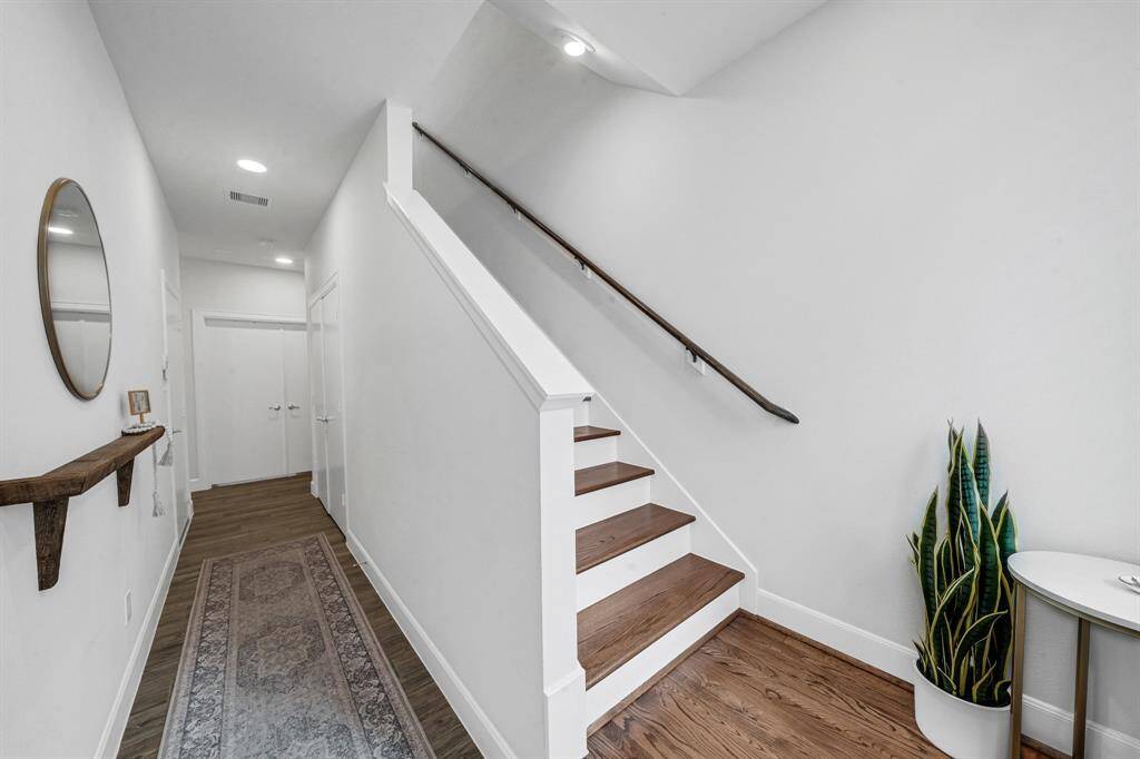 Main entrance with access to first floor living and staircase to open living and kitchen areas.