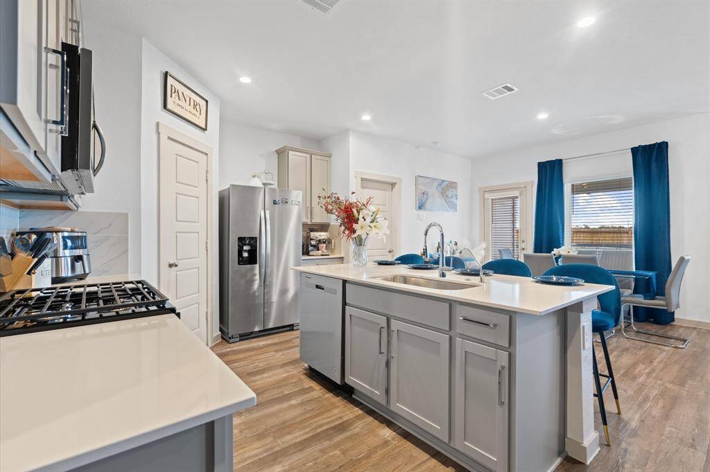Kitchen 17x11 - Gas Range and Beautiful Countertops