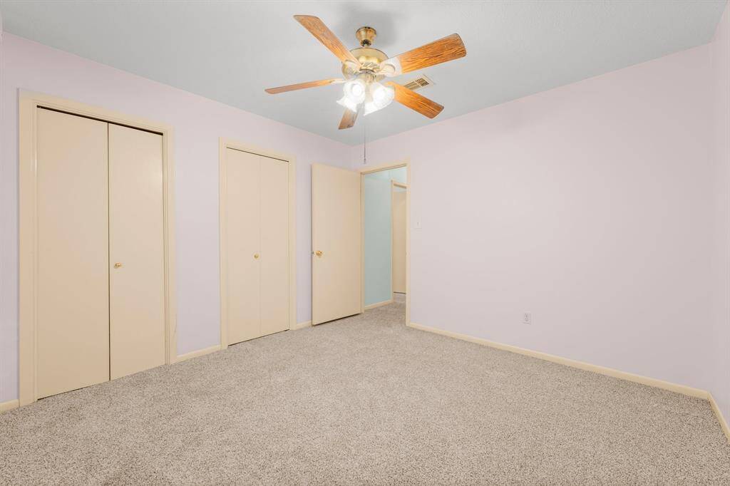 Bedroom 2 also offers convenient double closets, providing ample storage space for all your belongings.