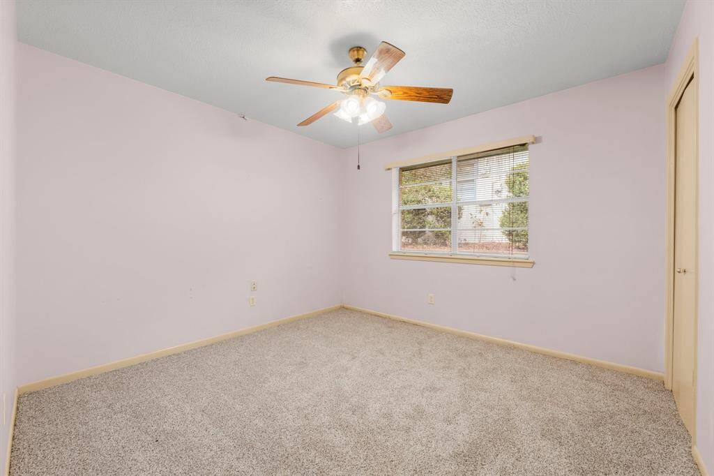 The spacious secondary full bath features a separate oversized vanity area, plenty of closet space, and a shower/toilet area for added convenience and functionality.