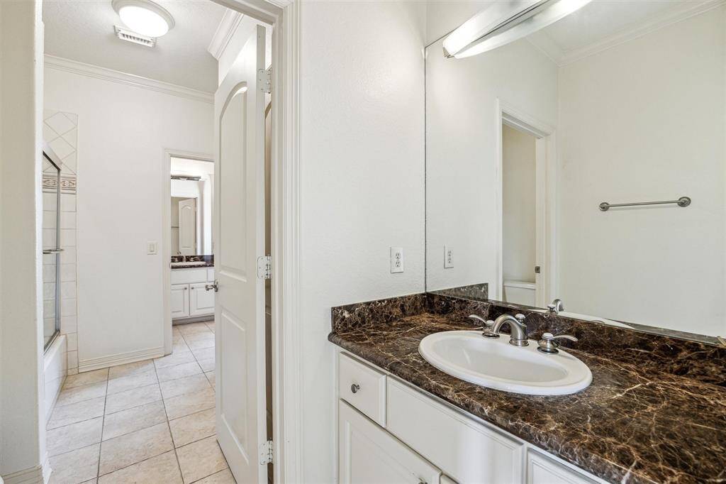 One of two upstairs full bathrooms, this one is a Hollywood bathroom.