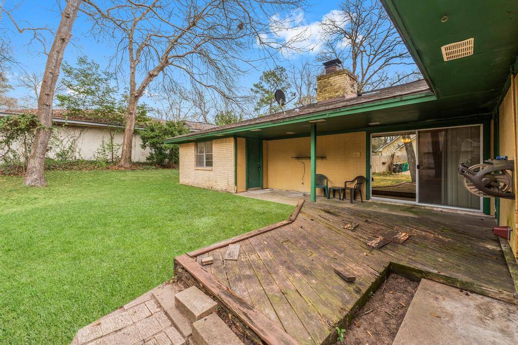 The backyard offers a spacious back patio area, along with an older deck that presents an opportunity for renovation or removal to create your perfect outdoor retreat. *Grass has been digitally enhanced