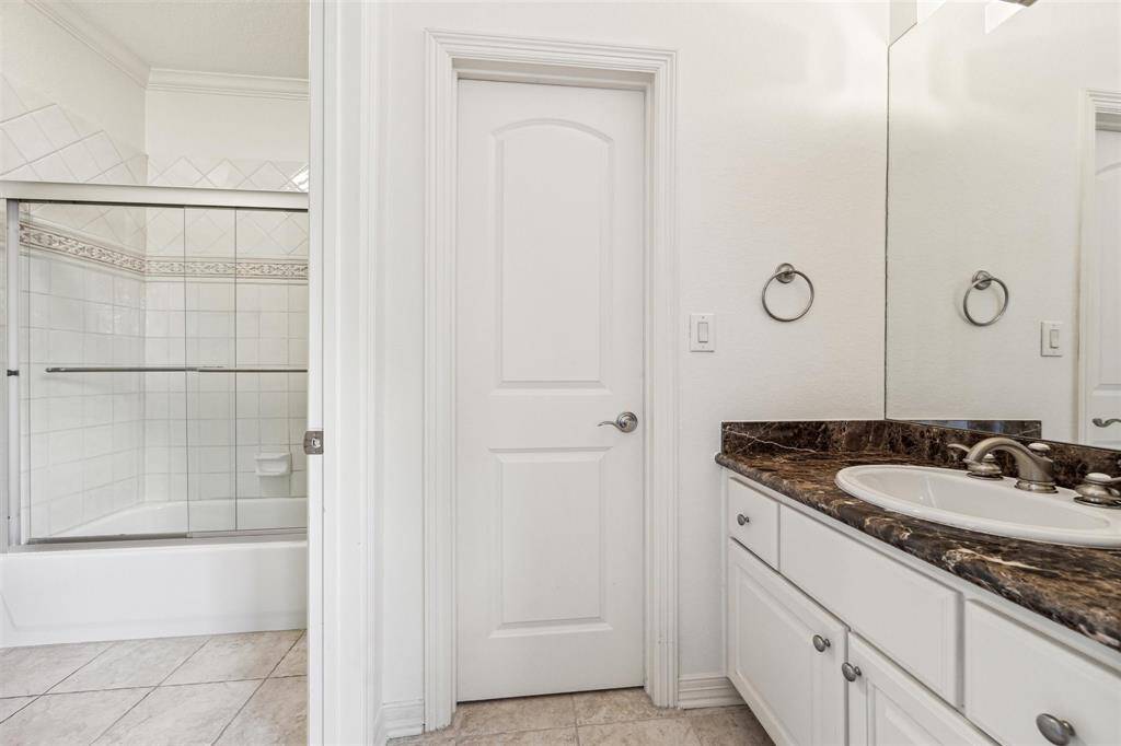 One of two upstairs full bathrooms, this one is a Hollywood bathroom.