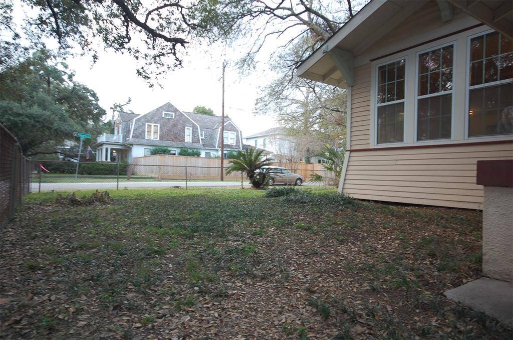 Front yard and also shows skirt design detail of house.