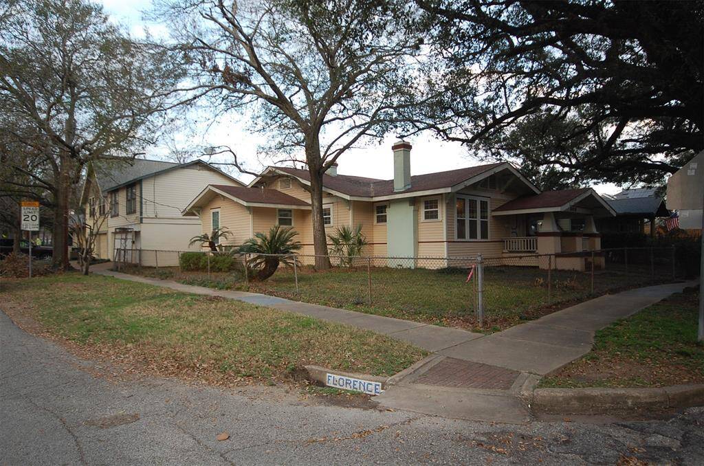 Picture take from the corner of Florence and Bayland. Main house in the forefront. 2-car garage and garage apartment is to the left.