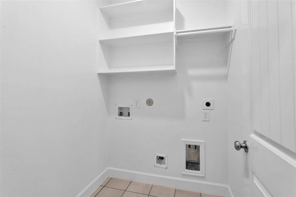This home has a dedicated utility room. While not present at the time of the pictures, a washer and dryer will be installed prior to move in!