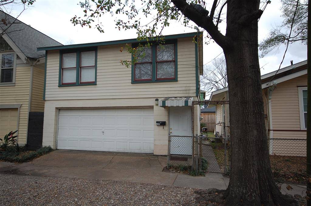 Detached large 2 car garage with leased apartment upstairs
