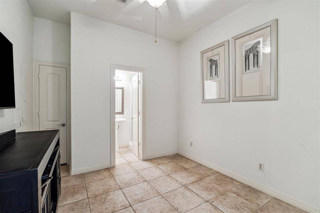 Potential quarters suite (would be bedroom option #6) is located downstairs adjacent to the garages and also has access to a walk-out door to the backyard area so it could be a convenient pool room or acclimated storage room