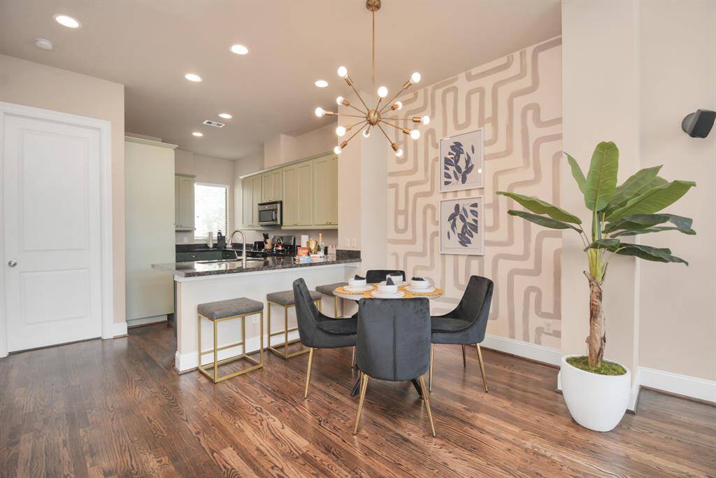 Overlooking the dining room, bar and kitchen from the living room