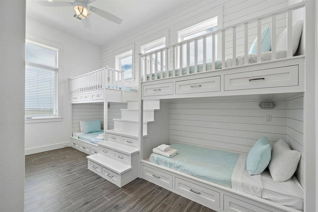 Bedroom 4 contains beautiful built-in bunks with added storage space