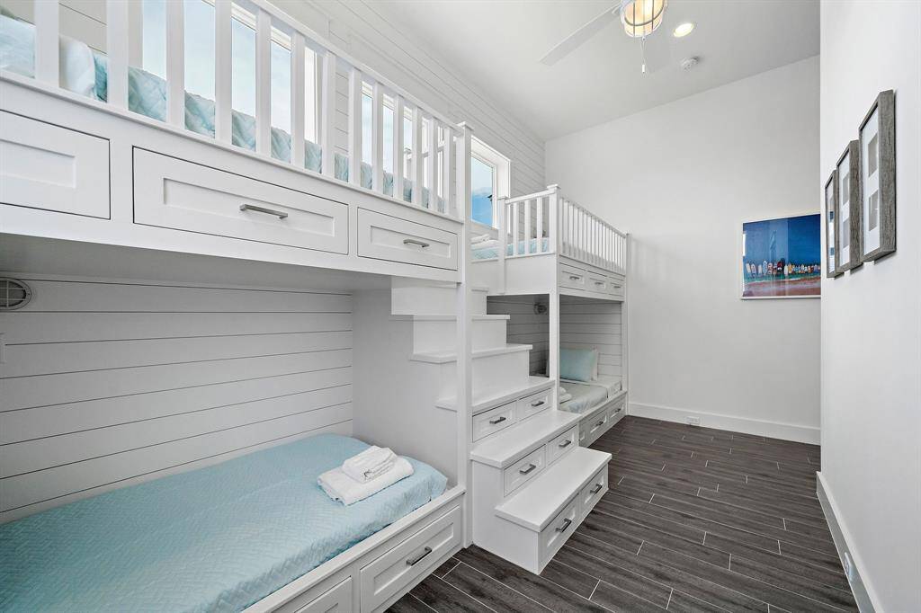 Bedroom 4 contains beautiful built-in bunks with added storage space