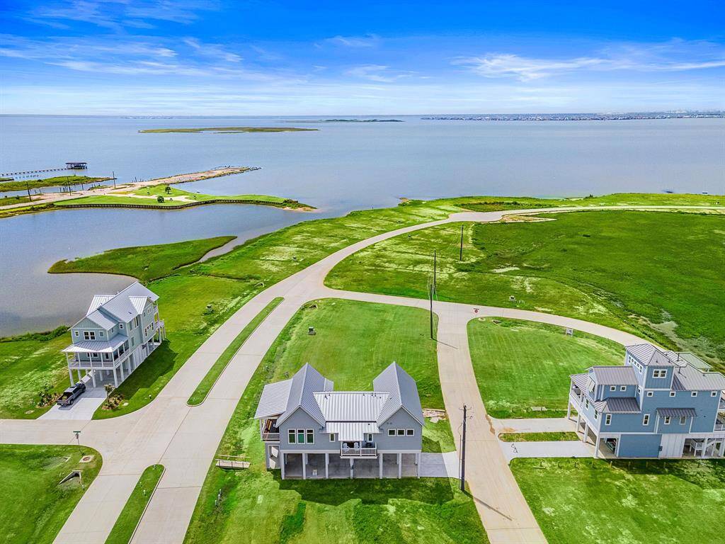 Enjoy coastal living with views of West Bay