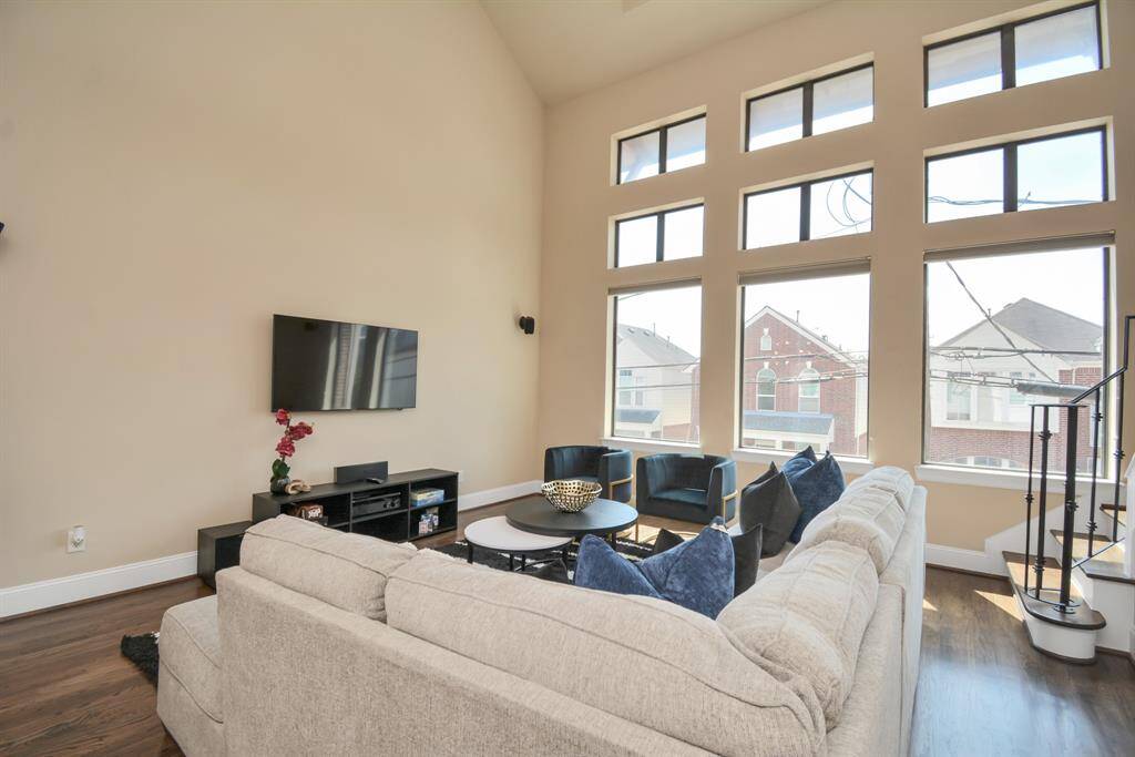 Huge windows with radiant barrier shades that help keep the home   energy efficient and comfortable
