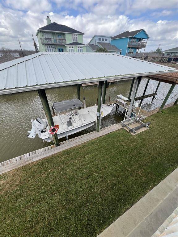 Aerial View of Covered Boat Dock, Boat Lift, Jet Ski Lift and Fish Cleaning Station