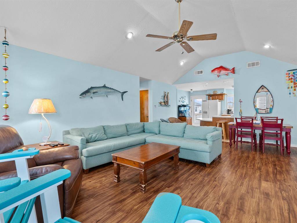Step into the Family Room open to dining and kitchen.