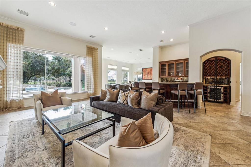 Family room views towards the wet bar and dining areas