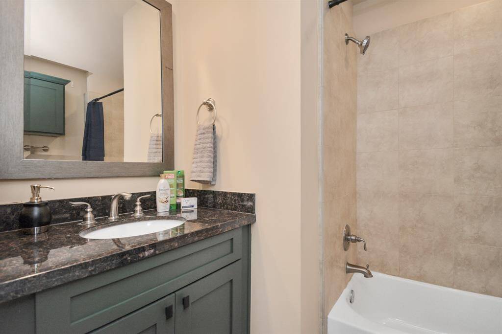 1st floor bathroom with updated shaker cabinets