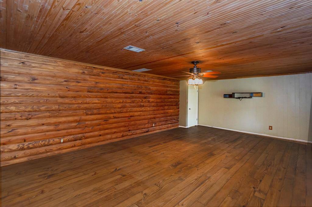 Cedar Exposed Wall Primary Bedroom