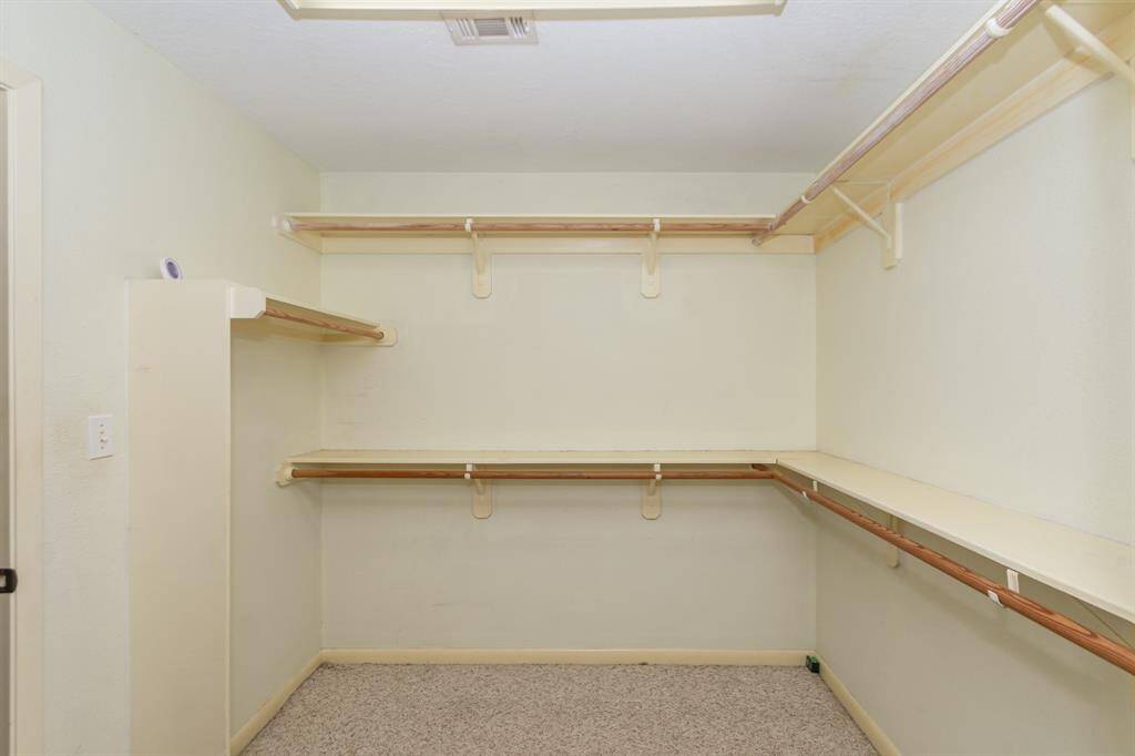 One of two primary closets