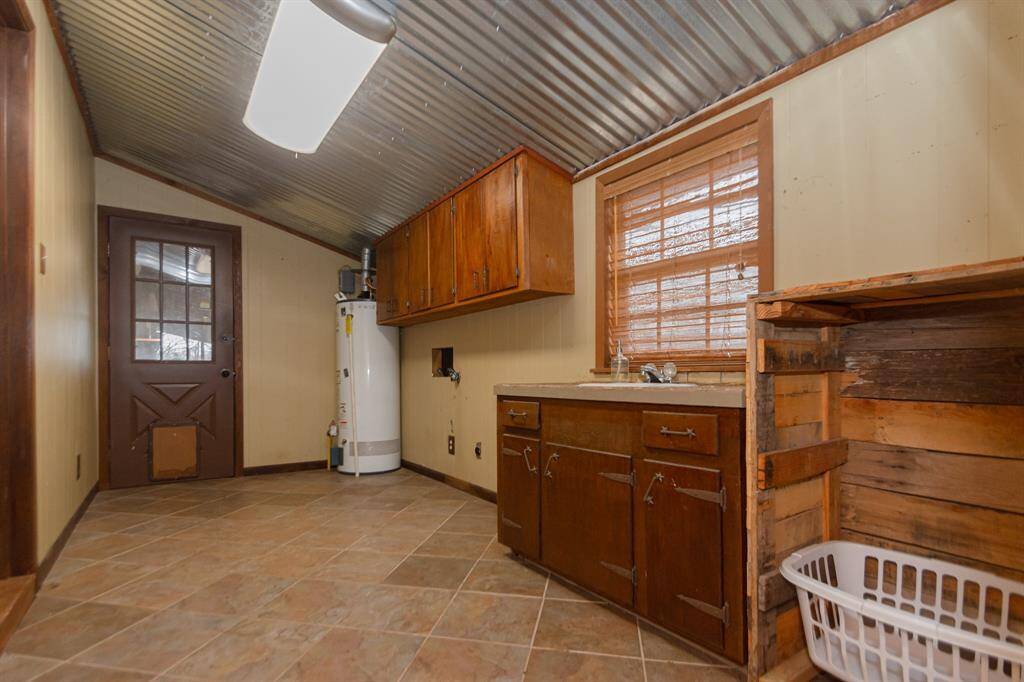 Utilityroom - Off Primary Bedroom with door to back porch