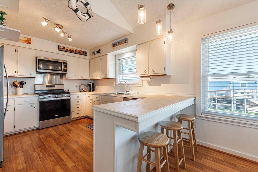 Updated Stainless Appliances In Kitchen