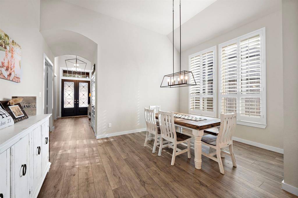 The formal dining room provides additional space for entertaining for just a simple meal at home.